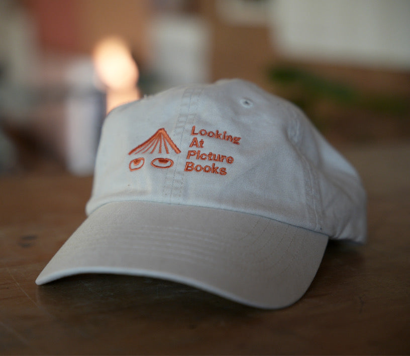YOUTH Looking At Picture Books Hat